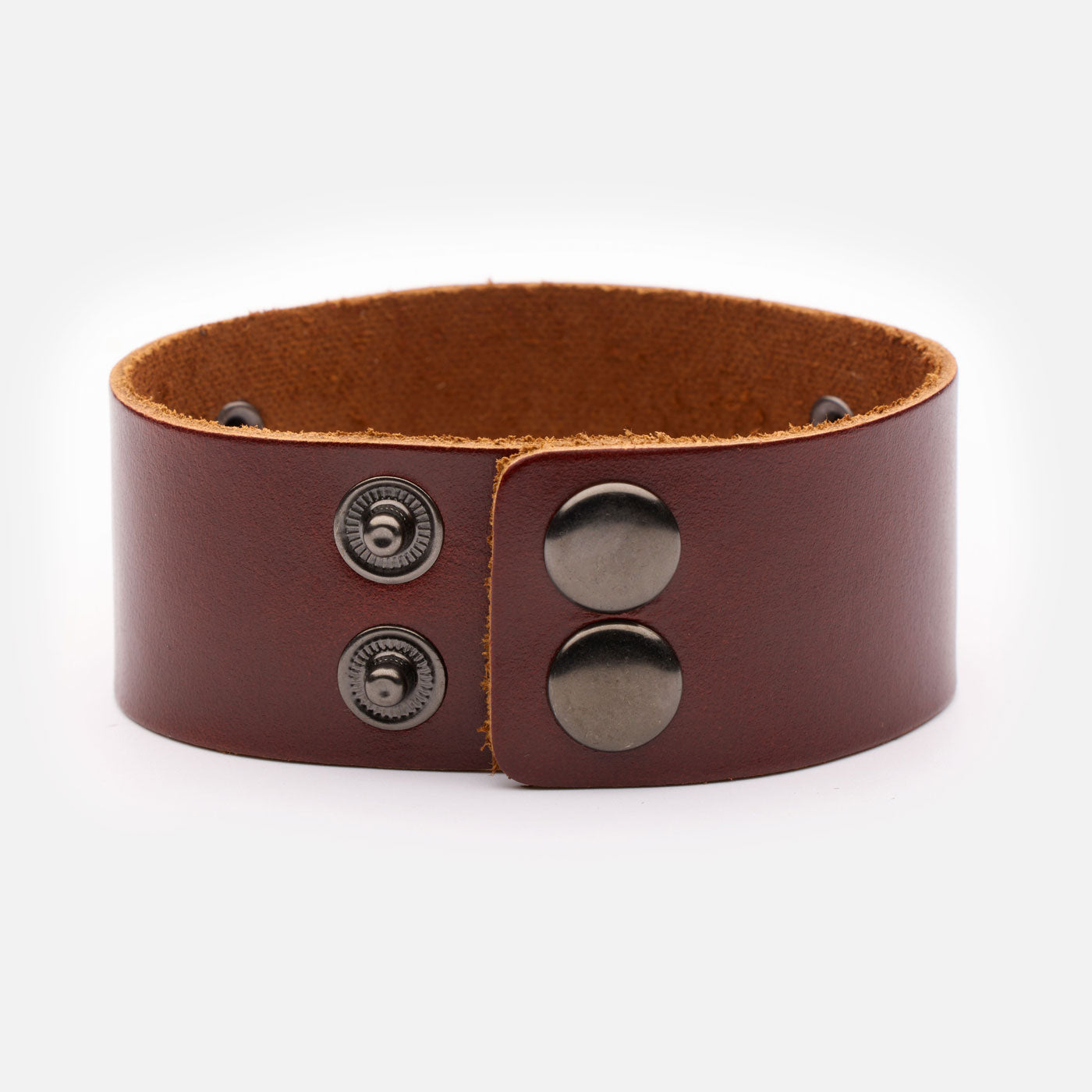 Back view of brown Viking leather bracelet showing dual snap button closure for adjustable fit.