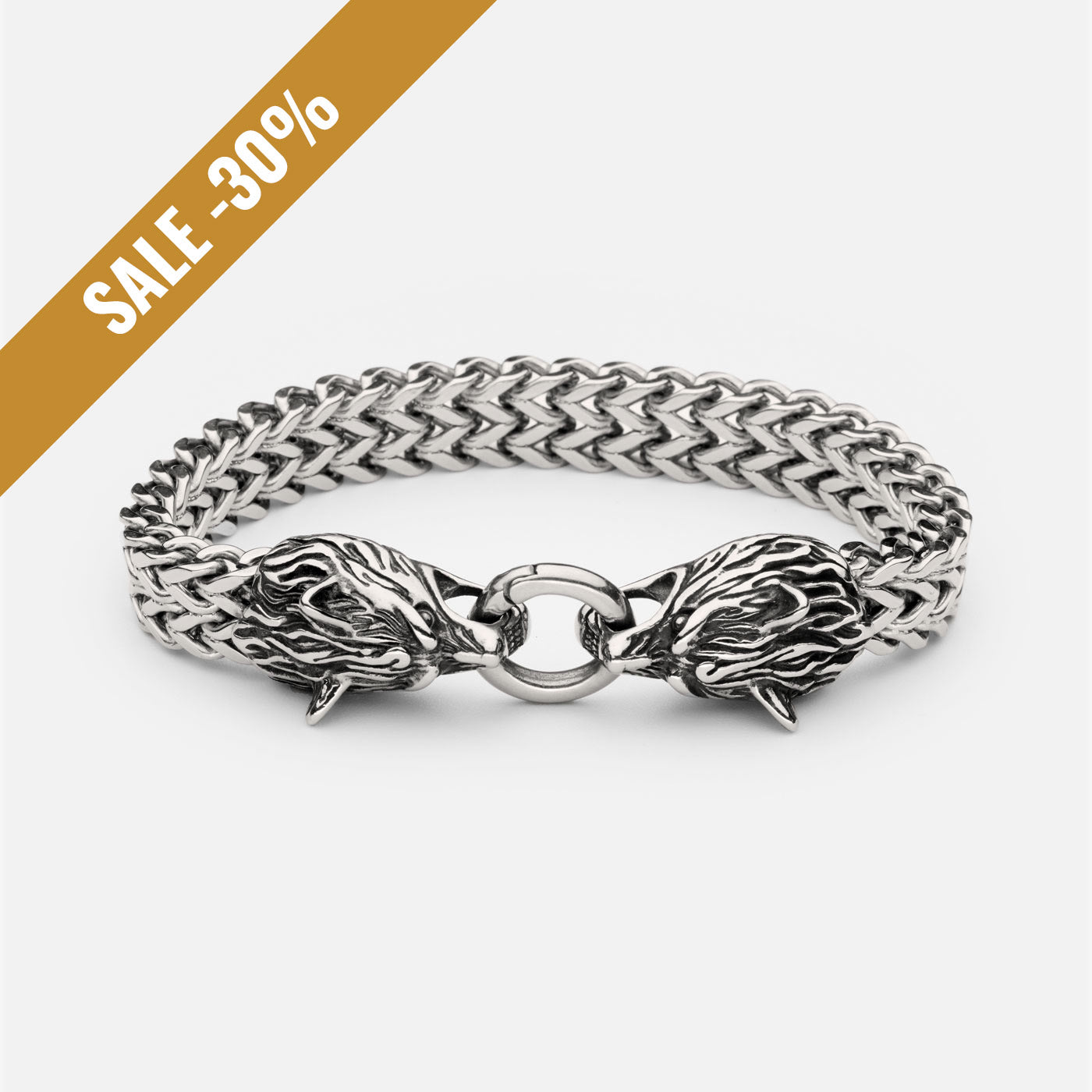 Full view of the stainless steel Geri and Freki wolf bracelet from Odin Trinkets, featuring intricately detailed wolf heads clasping a central ring, symbolizing Odin’s legendary companions with a sale banner