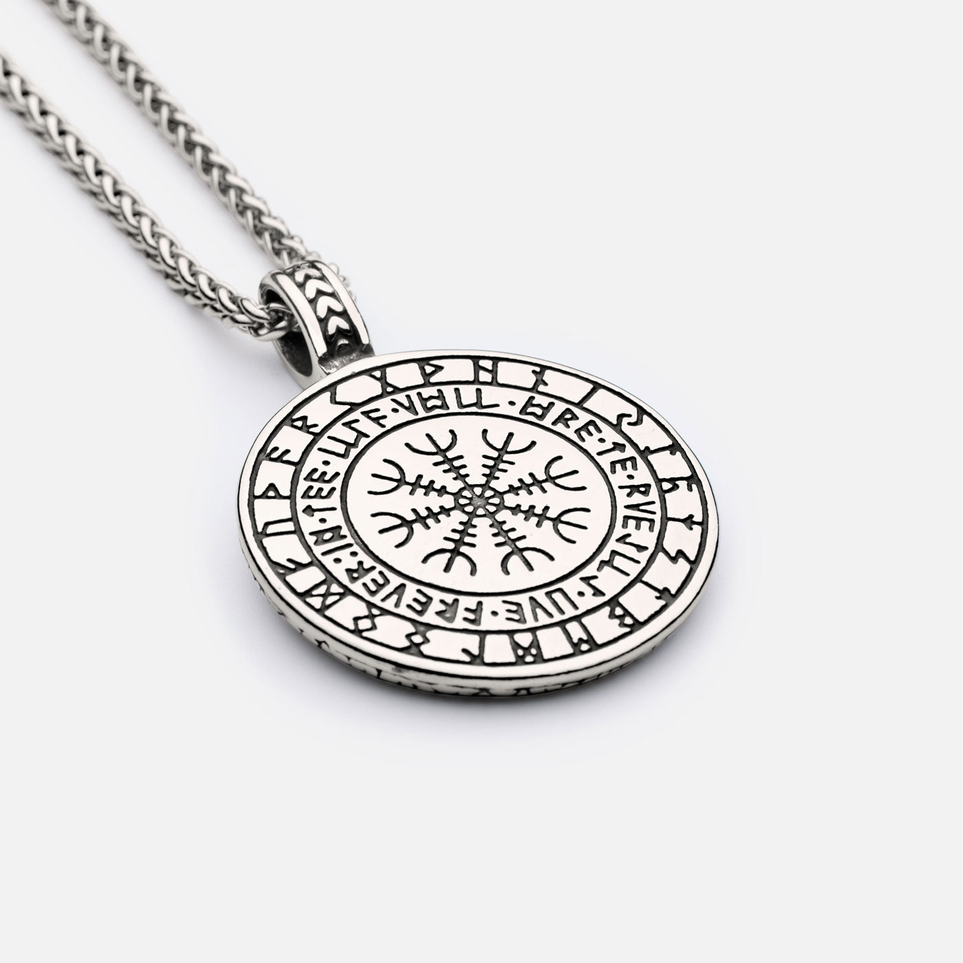 Back of Norse necklace with Helm of Awe (Ægishjálmur) and runic circle, a Viking symbol of protection and strength.