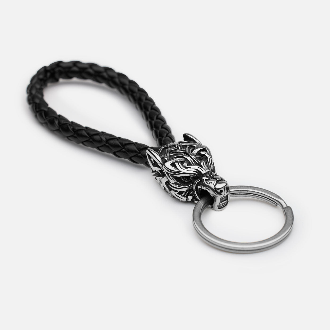 Viking Fenrir wolf head keychain with braided black leather loop and stainless steel split ring, studio shot on white.