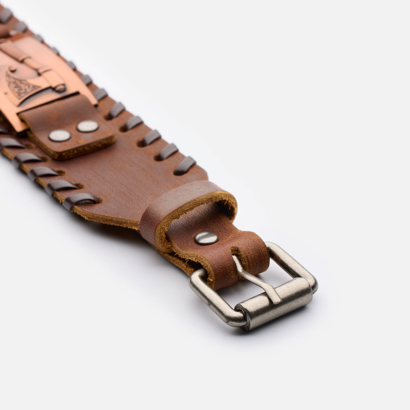 Close-up of the brown leather strap with Viking buckle and axe plate details