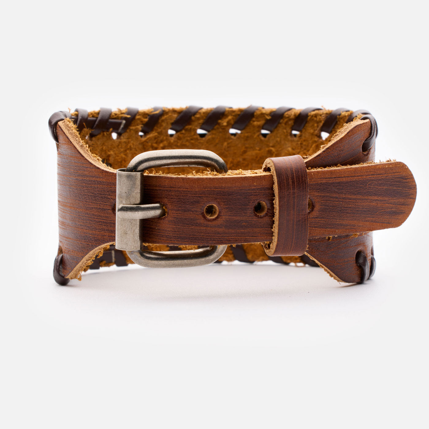 Backside of brown leather bracelet with vintage bronze buckle and hand-sewn details