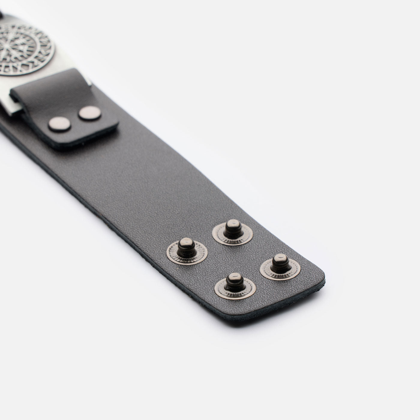 Flat open view of Viking leather bracelet with four metal snaps for two size options and strong hold.