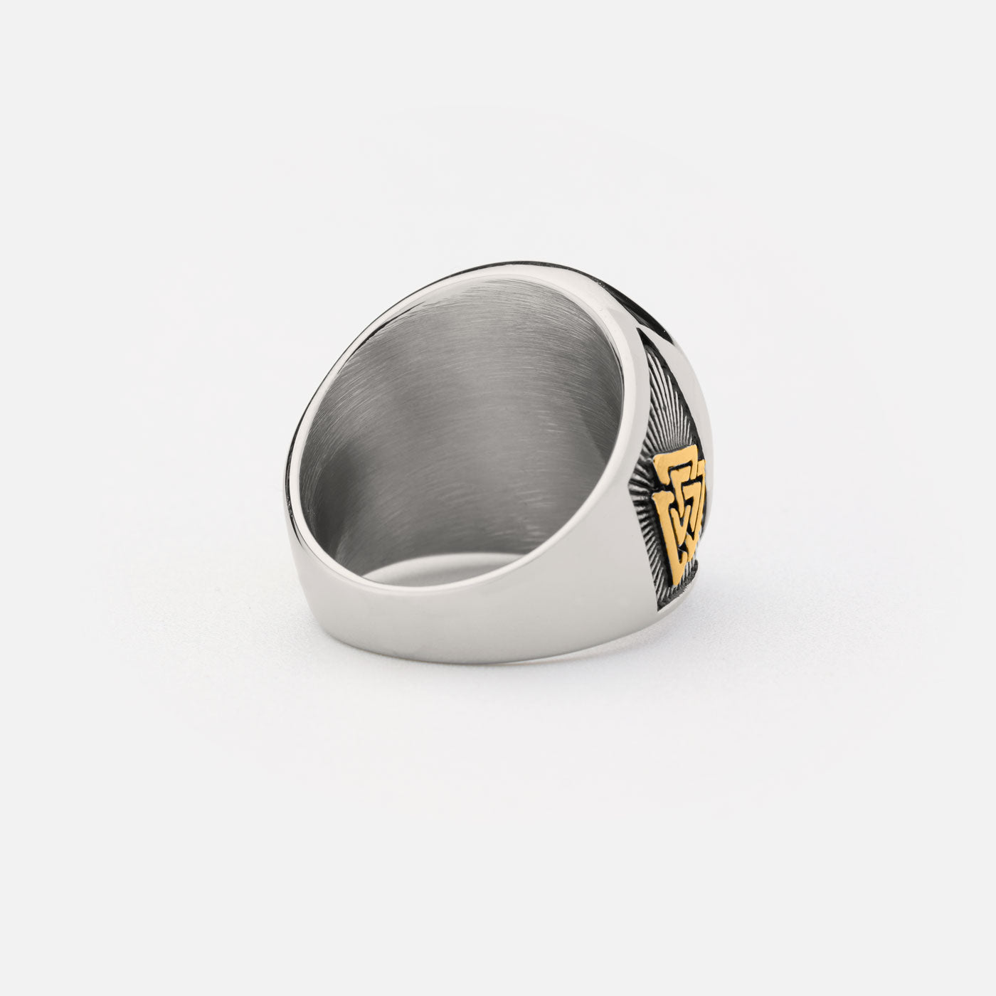 Stainless steel Valknut ring with engraved Norse runes and golden accents, symbolizing Odin's power.