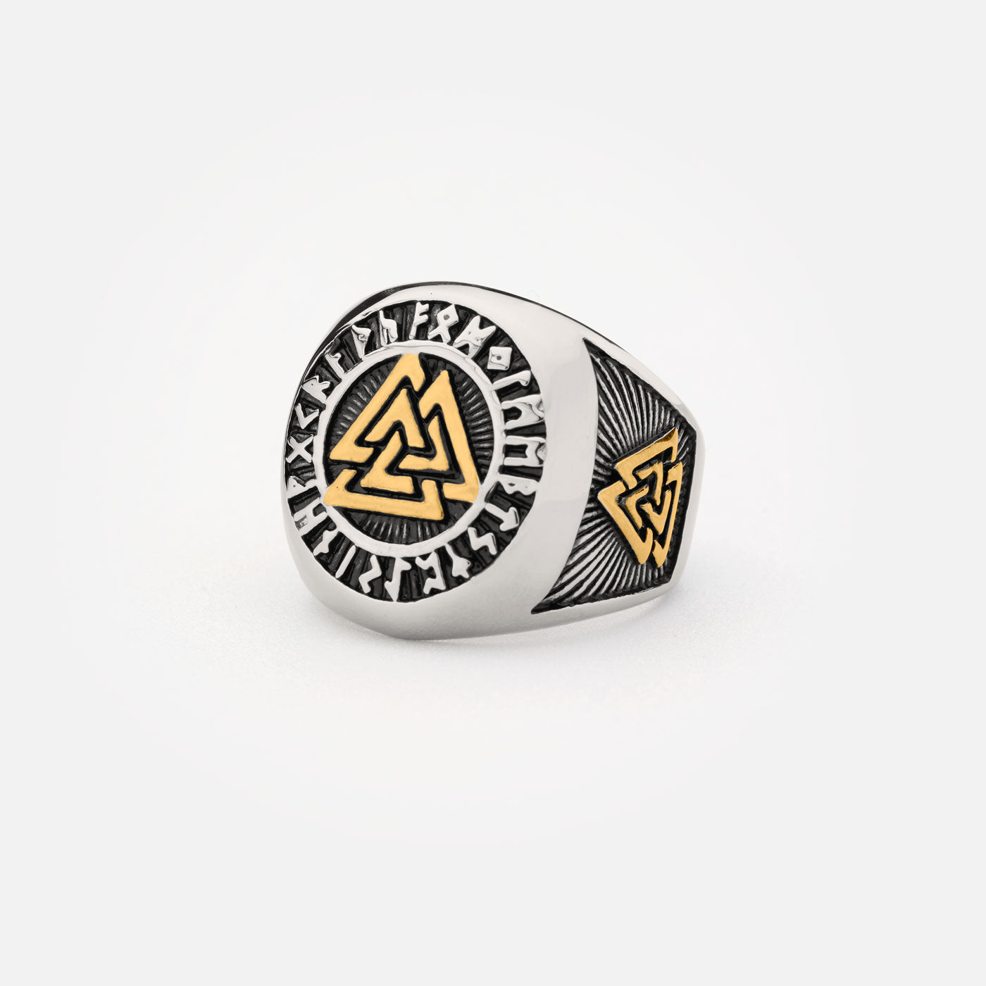 Stainless steel Valknut ring with engraved Norse runes and golden accents, symbolizing Odin's power.