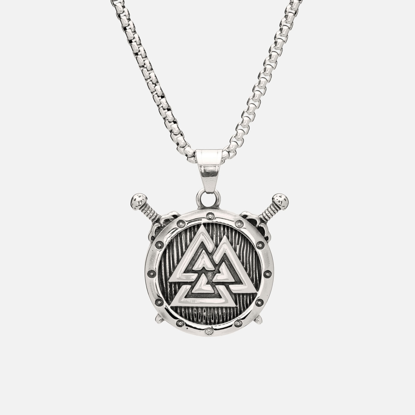 Frontal view of Norse Valknut necklace with shield and crossed swords design, symbolizing Odin’s warriors, on a Viking box chain.