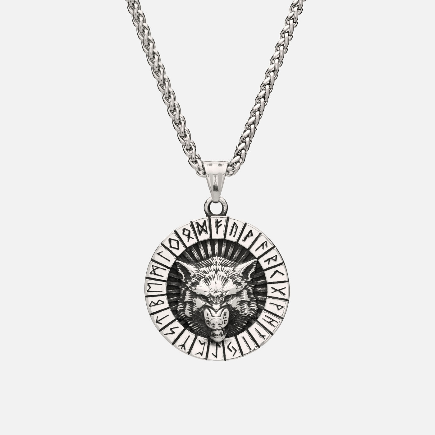 Front view of Viking wolf necklace with Elder Futhark runes and fierce wolf head, hanging on a strong stainless steel curb chain.