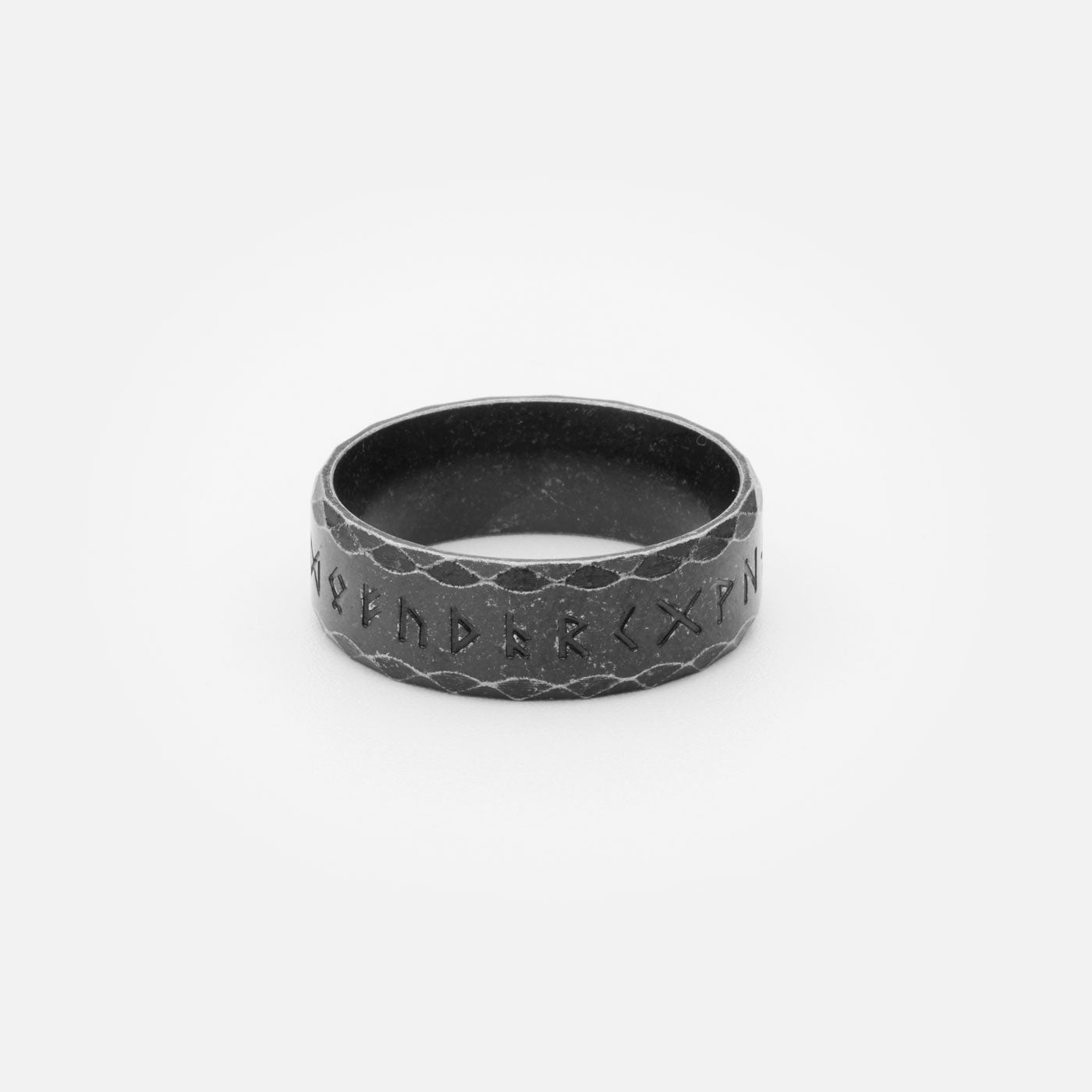 Antique Viking Rune Ring with Elder Futhark Engraving – Aged black stainless steel ring featuring the full Elder Futhark rune alphabet, encircled by a subtle Nordic pattern.