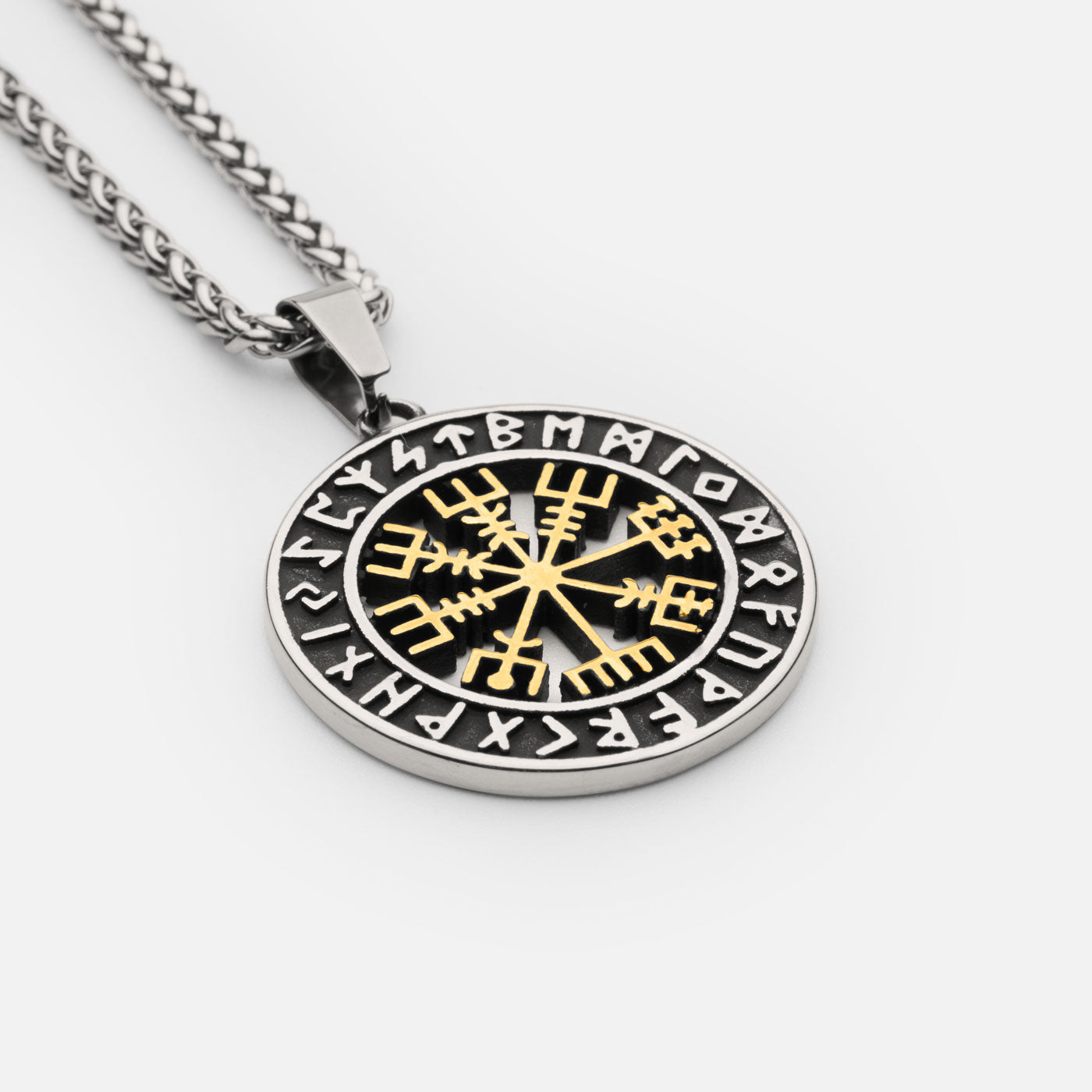 Bold gold Vegvisir pendant necklace with Elder Futhark runes, symbolizing Viking guidance and protection – a striking statement piece from Odin Trinkets.