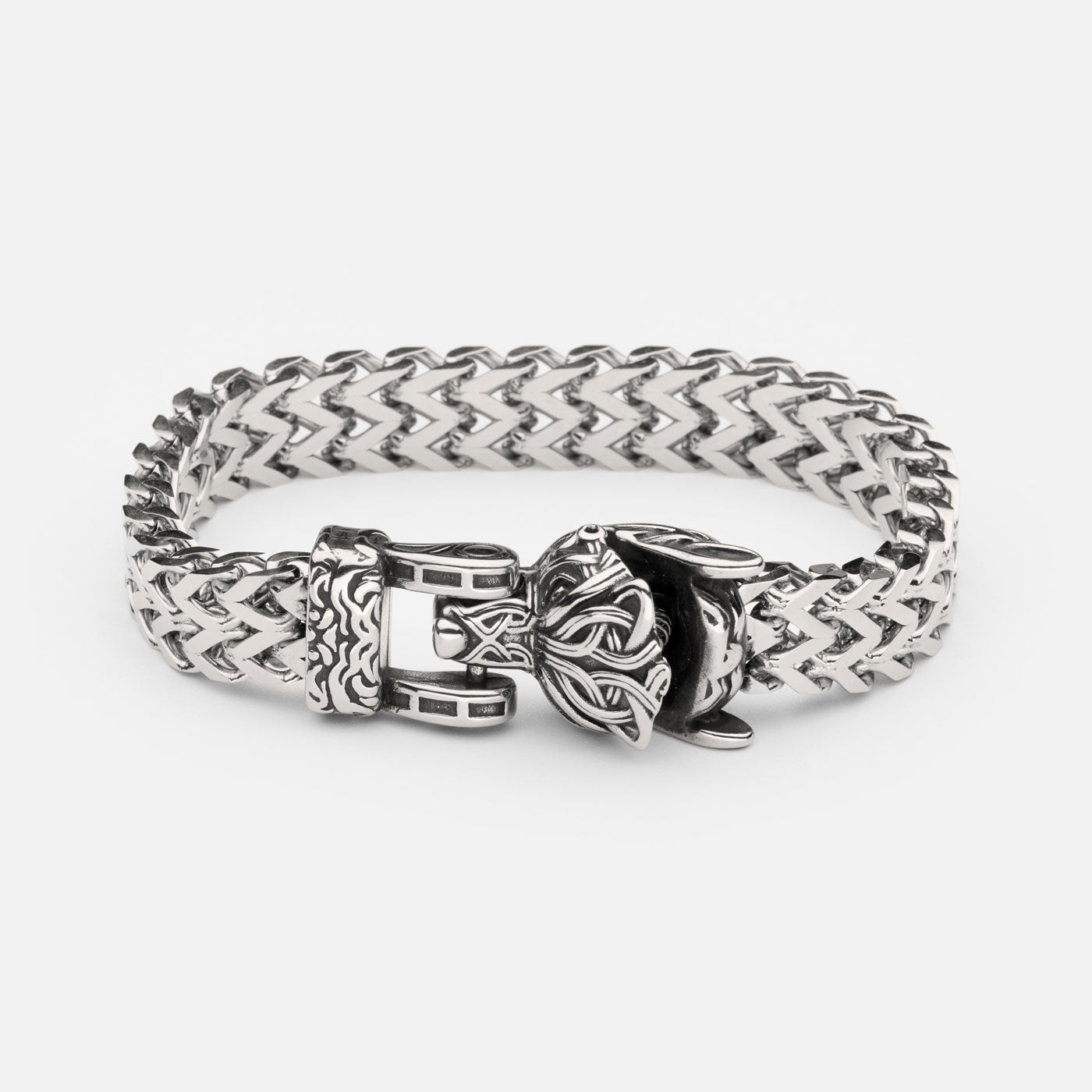 Full view of the stainless steel Fenrir wolf bracelet from Odin Trinkets, featuring an intricately designed wolf head clasp and bold Viking-inspired chain pattern.