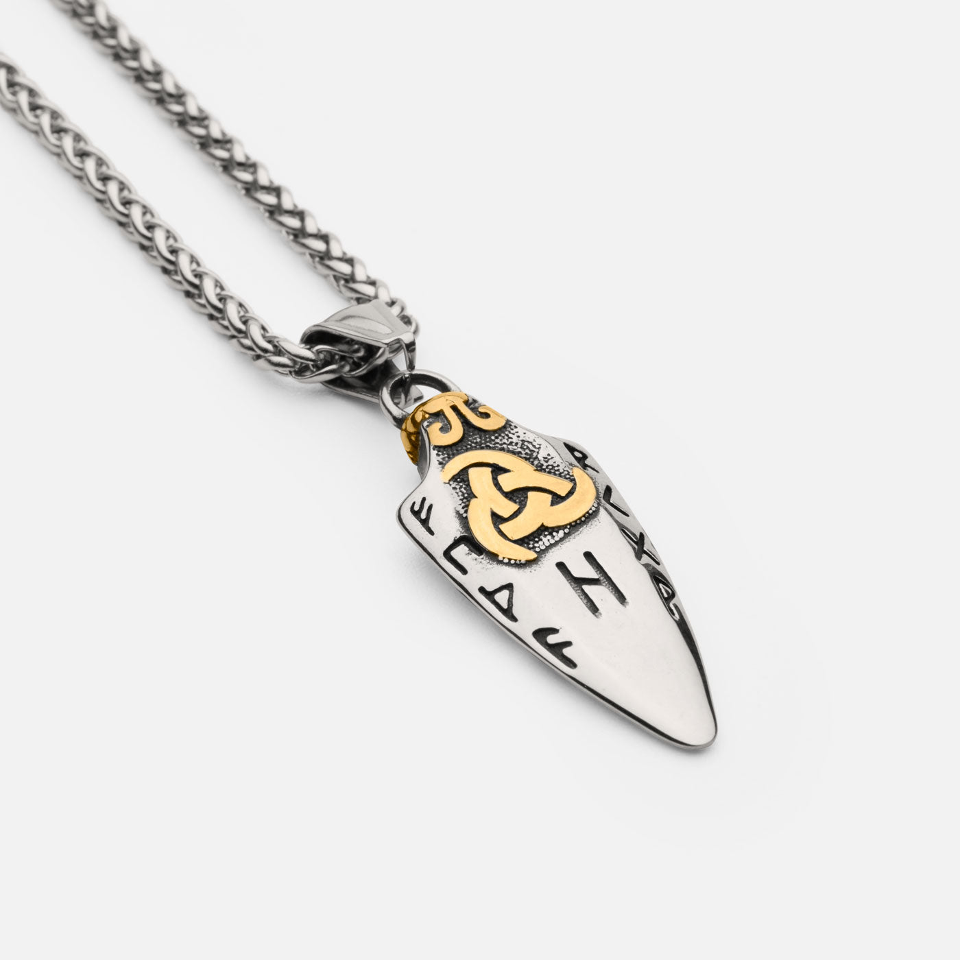 Back view of the stainless steel Gungnir spear pendant in gold and silver from Odin Trinkets, featuring engraved Norse runes and a bold gold-accented Valknut symbol representing Odin and Viking heritage.