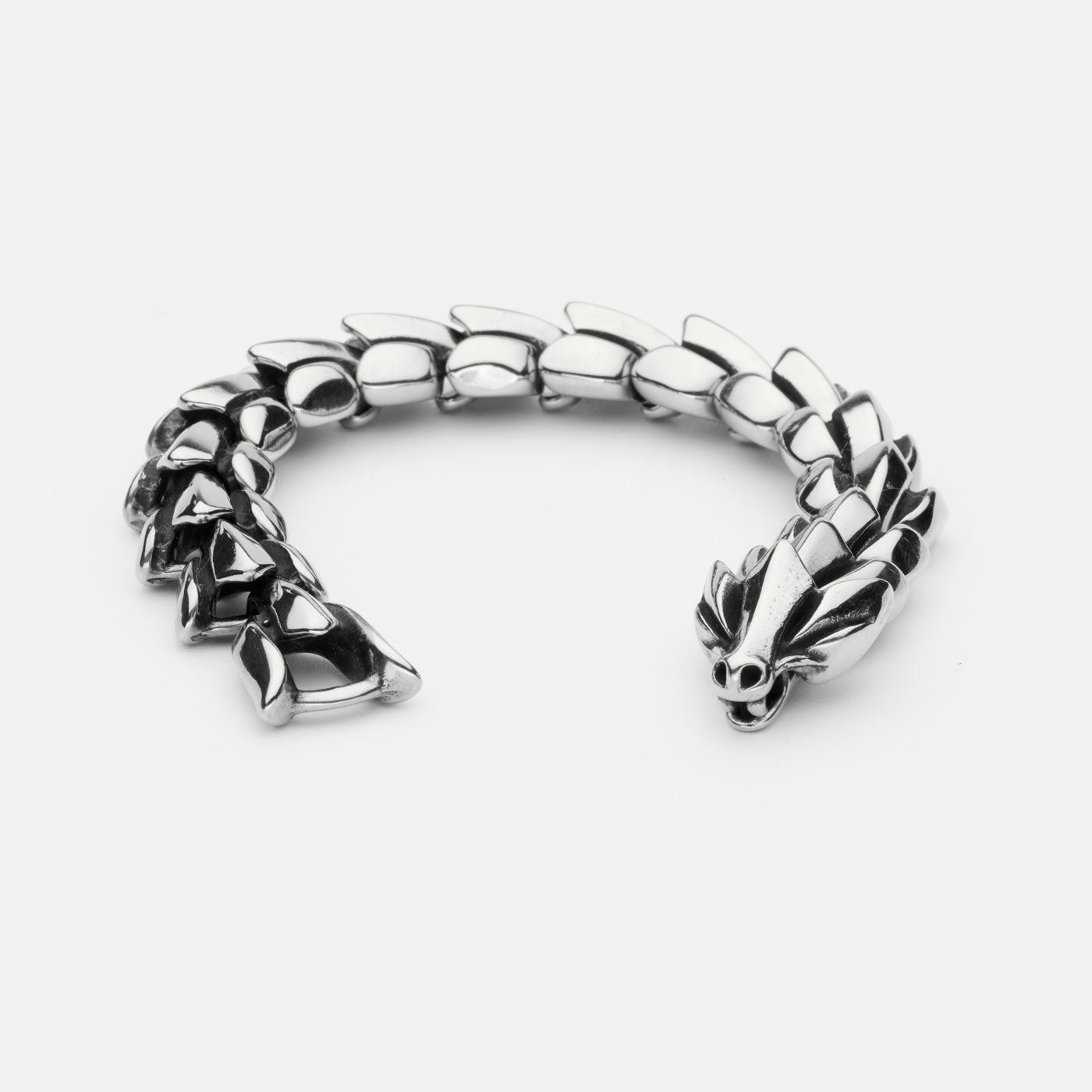 Open view of the stainless steel Jörmungandr bracelet from Odin Trinkets, designed to resemble the legendary Norse World Serpent with a striking scaled pattern and serpent head clasp.