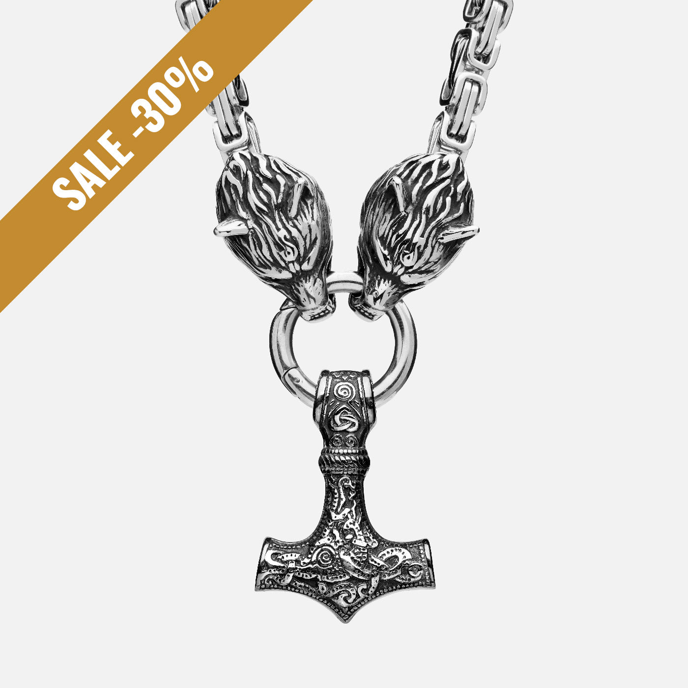 Front view of the stainless steel Mjölnir pendant in silver from Odin Trinkets, featuring intricate Viking engravings, Geri & Freki wolf head clasps, and a bold Norse King’s chain. with sale banner