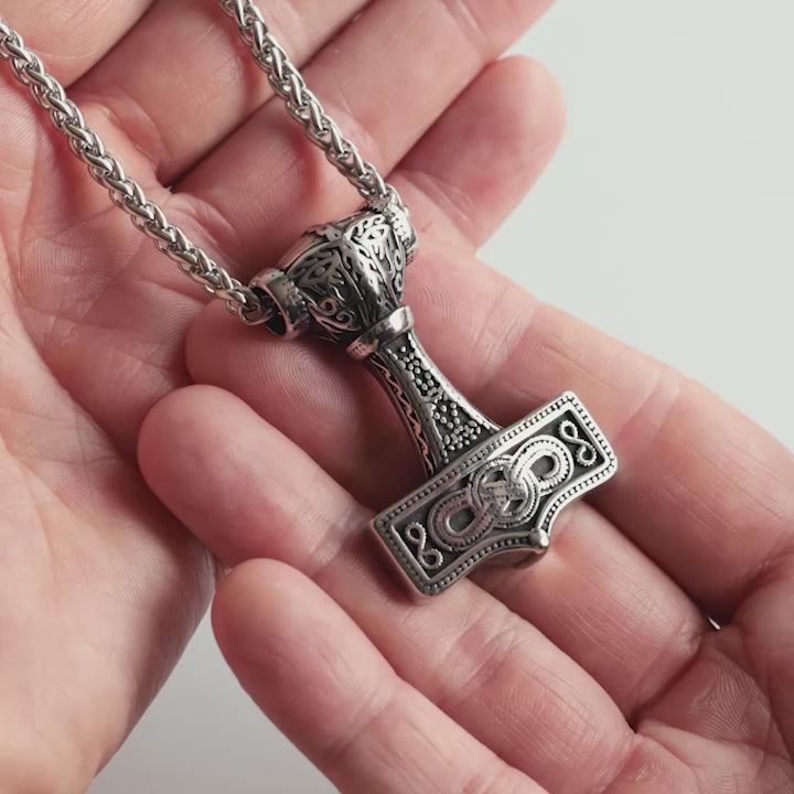 Close-up Video of the Mjölnir of Asgard pendant showing Norse knotwork in antique silver