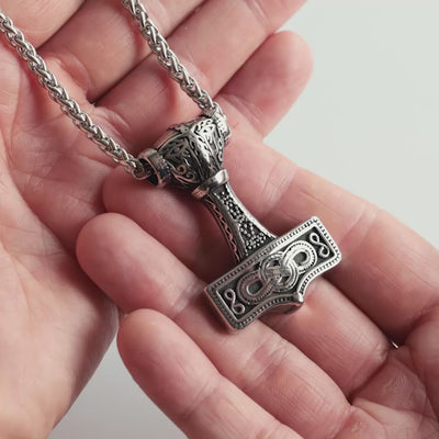 Close-up Video of the Mjölnir of Asgard pendant showing Norse knotwork in antique silver
