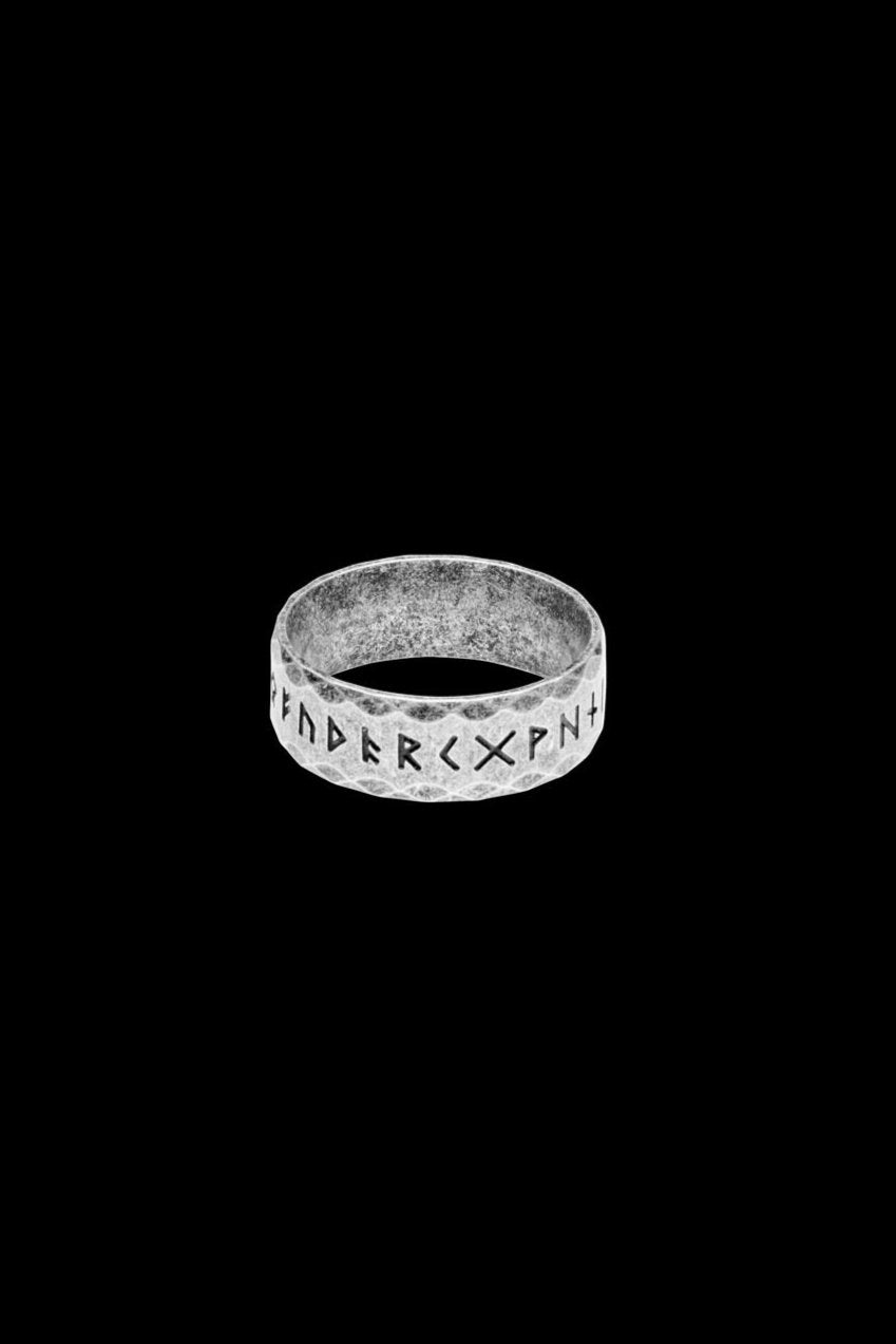 A retro-style stainless steel rune ring with a gray finish, referred to as the "Retro" variation, showcasing the engraved Elder Futhark alphabet. The textured surface complements the ancient Norse aesthetic.