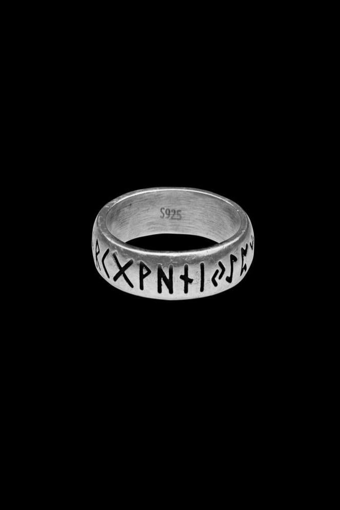 An S925 sterling silver ring engraved with the Elder Futhark alphabet, featuring ancient Norse runes that symbolize wisdom, protection, and a connection to Viking heritage. The inner side of the ring showcases the S925 stamp, emphasizing its genuine silver quality.